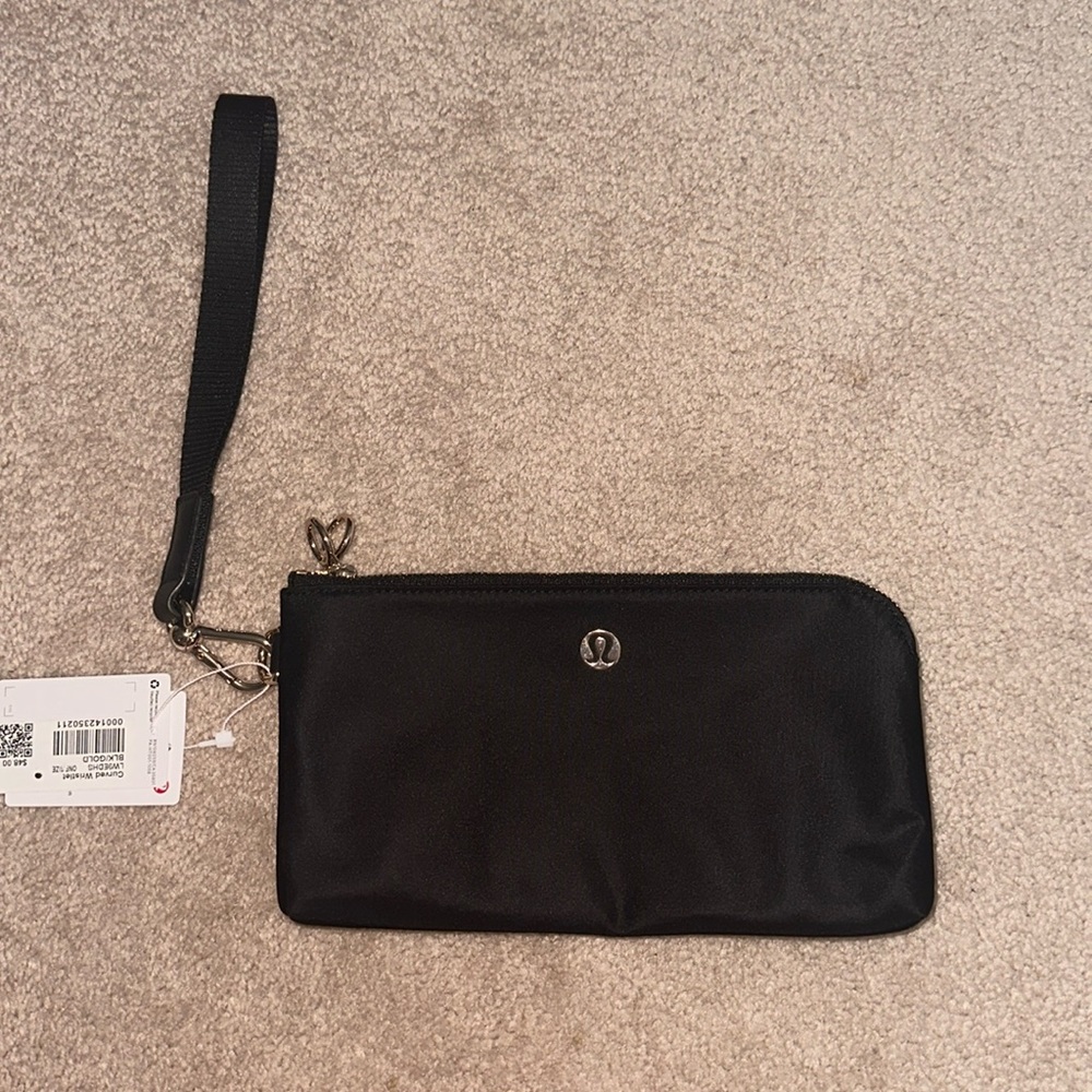 lululemon black and gold wristlet